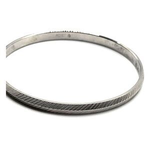 Monet Embossed Silver Metal Bangle Bracelet 7in